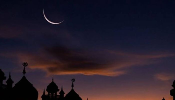 Moon in the sky with Eid message